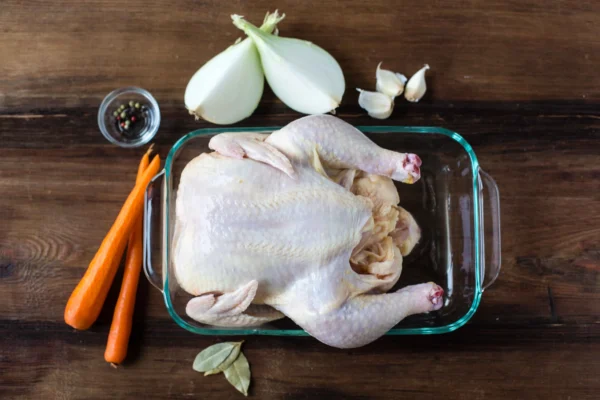 how long to boil a whole chicken